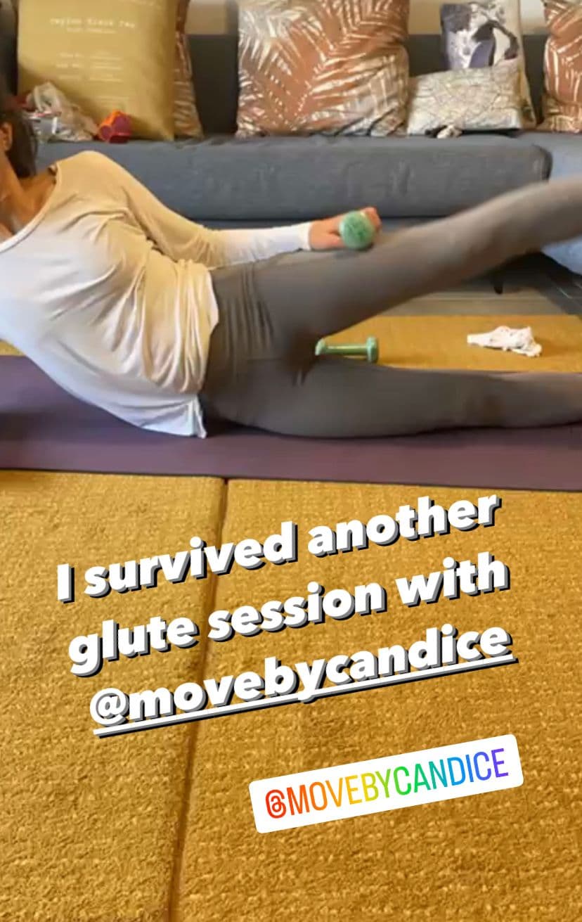 Member training through pregnancy, captioned: "Feeling good working my bump with @movebycandice"